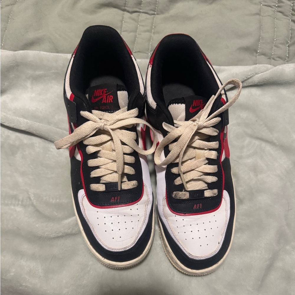 Women’s Nike Air Force 1 Black, White, and Red Sneakers